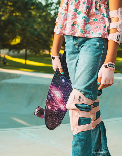 Load image into Gallery viewer, Skateboards for Kids, Teens and Adults | Premium Skateboard Gift Set for Beginners and Pros Complete with Mini Cruiser Board + Skateboard Backpack + Video Course + Speed Control + Skate Tool
